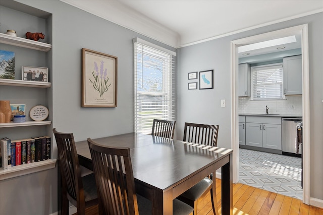 dining space with light wood-type flooring