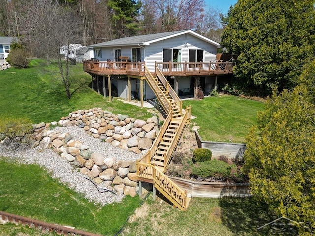 4438 N Verity Rd, Sanford, MI 48657 - back of house featuring a yard, a deck, and stairs