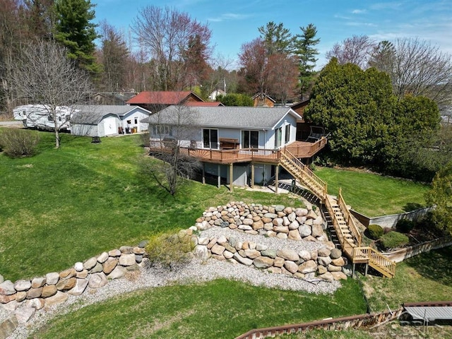 4438 N Verity Rd, Sanford, MI 48657 - back of property with a deck, a yard, and stairway