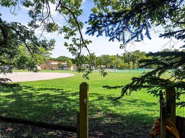 927 Carver St, Traverse City, MI 49686 - view of community with a lawn and fence
