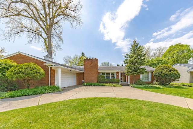 605 S Higbie Pl, Grosse Pointe Woods, MI 48236 - ranch-style home featuring concrete driveway, brick siding, a front yard, an attached garage, and a chimney