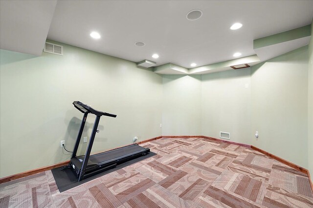 workout room featuring recessed lighting, visible vents, and carpet