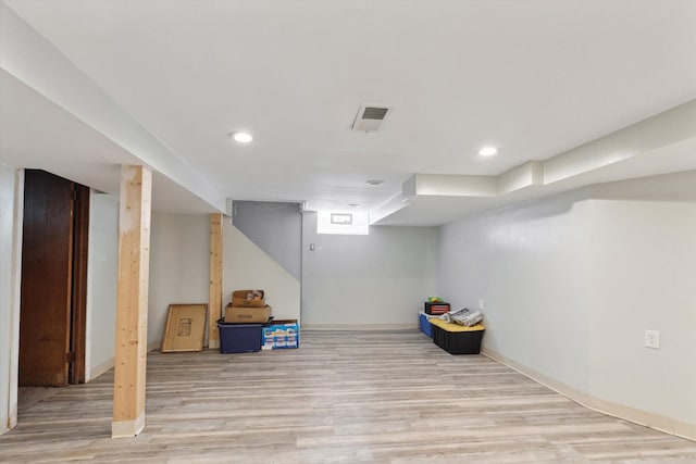 17172 Huntington Rd, Detroit, MI 48219 - finished below grade area with visible vents, recessed lighting, light wood finished floors, and baseboards