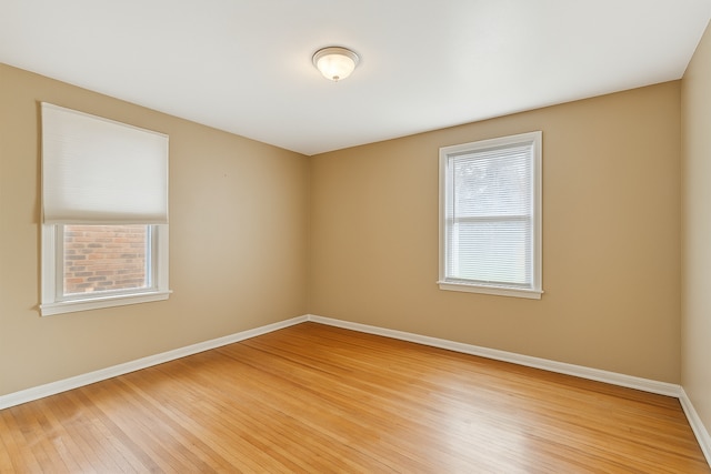 17172 Huntington Rd, Detroit, MI 48219 - spare room with baseboards and light wood-style flooring