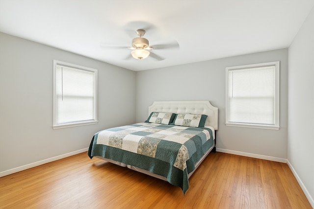 17172 Huntington Rd, Detroit, MI 48219 - bedroom featuring a ceiling fan, baseboards, and wood finished floors
