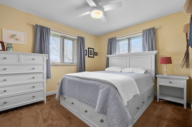 3529 E Lemon Creek Rd, Berrien Springs, MI 49103 - bedroom with dark colored carpet, baseboards, and ceiling fan