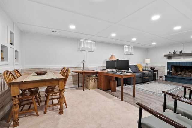 3529 E Lemon Creek Rd, Berrien Springs, MI 49103 - home office with recessed lighting, light wood-style floors, a brick fireplace, built in shelves, and wainscoting