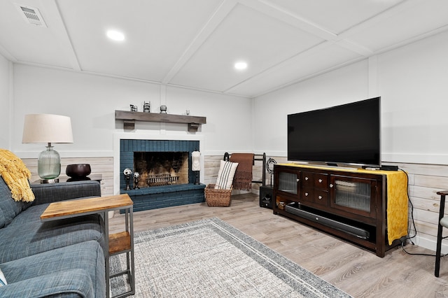 3529 E Lemon Creek Rd, Berrien Springs, MI 49103 - living room featuring wood finished floors, a fireplace, recessed lighting, and a wainscoted wall