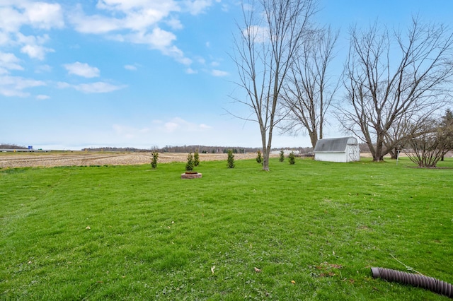 3529 E Lemon Creek Rd, Berrien Springs, MI 49103 - view of green lawn with a barn, an outbuilding, a view of rural / pastoral area, and an outdoor fire pit