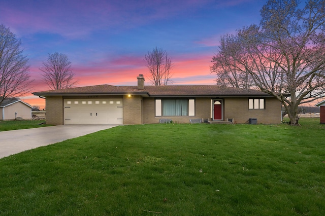 3529 E Lemon Creek Rd, Berrien Springs, MI 49103 - ranch-style house featuring a chimney, a garage, driveway, and a lawn