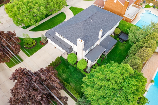 view from above of property featuring a pool area