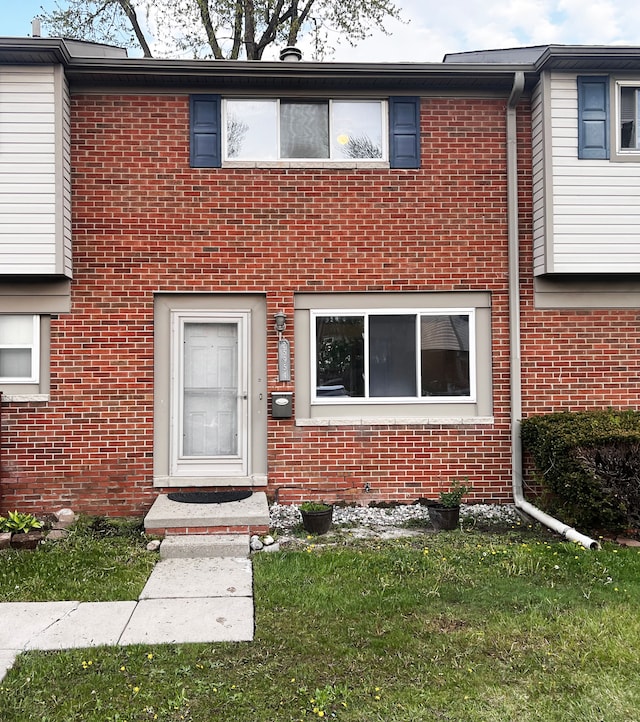 25954 Salem Unit 5, Roseville, MI 48066 - view of property featuring brick siding and a front lawn