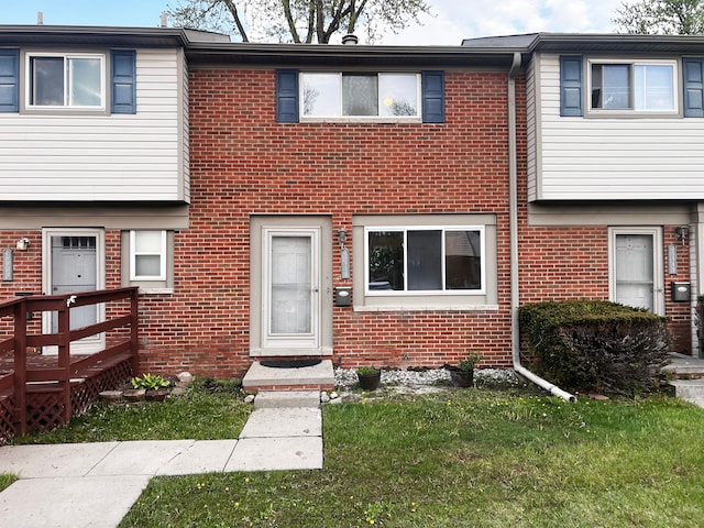 25954 Salem Unit 5, Roseville, MI 48066 - townhome / multi-family property with brick siding and a front yard