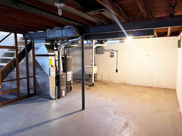 25954 Salem Unit 5, Roseville, MI 48066 - basement with a sink, heating unit, and water heater