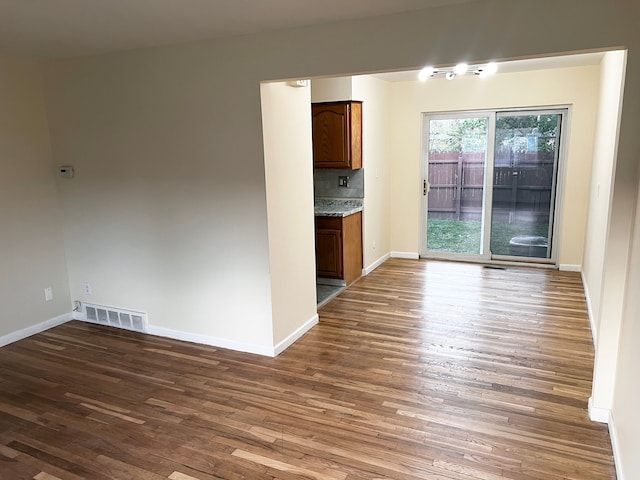 25954 Salem Unit 5, Roseville, MI 48066 - interior space featuring baseboards, dark wood-type flooring, and visible vents