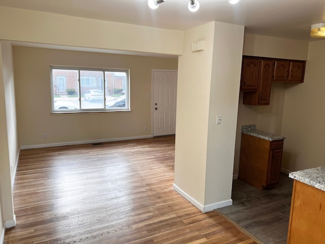 25954 Salem Unit 5, Roseville, MI 48066 - empty room featuring baseboards and wood finished floors