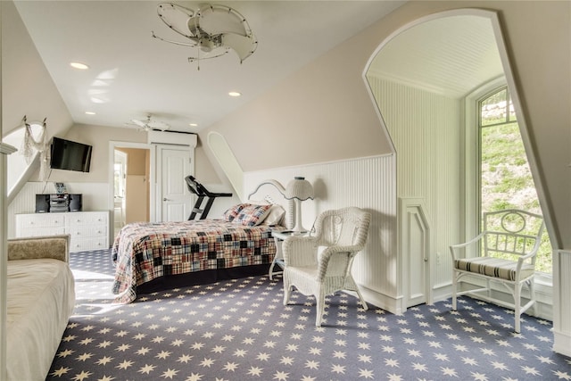 bedroom with carpet flooring, recessed lighting, and a wall mounted air conditioner