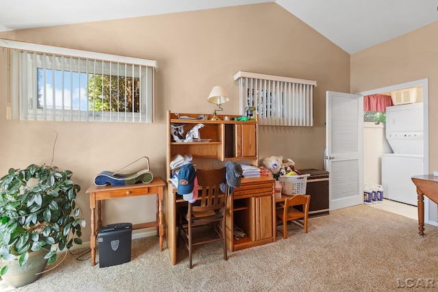 dining area with carpet floors, stacked washer and clothes dryer, and lofted ceiling
