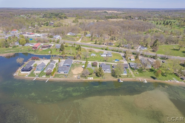 bird's eye view with a residential view and a water view