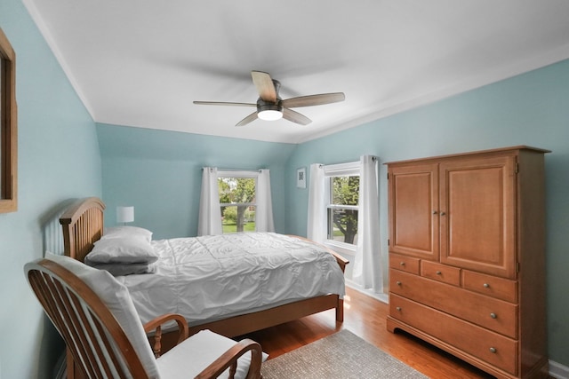 1732 14th St, Wyandotte, MI 48192 - bedroom featuring light wood finished floors, a ceiling fan, and baseboards