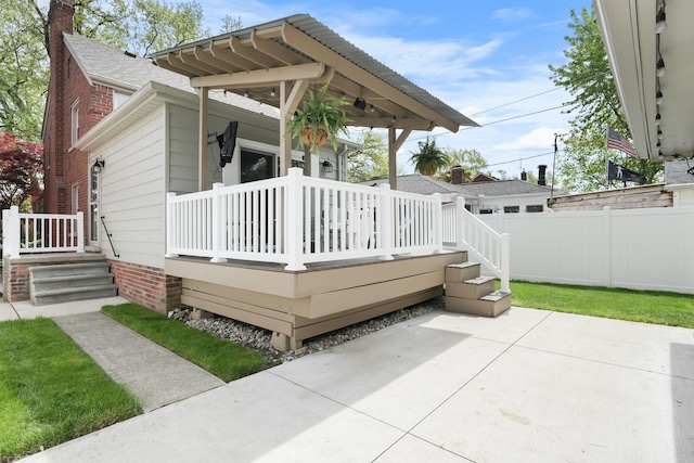 1732 14th St, Wyandotte, MI 48192 - view of front of property featuring fence, brick siding, a chimney, roof with shingles, and a patio