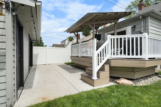 1732 14th St, Wyandotte, MI 48192 - view of home's exterior featuring a patio, a deck, and fence