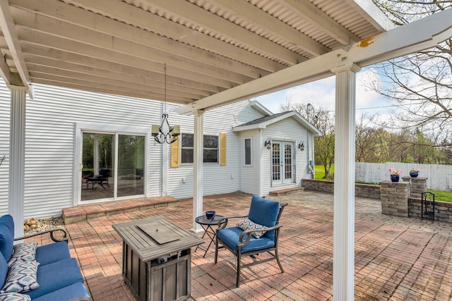 view of patio / terrace with fence and french doors