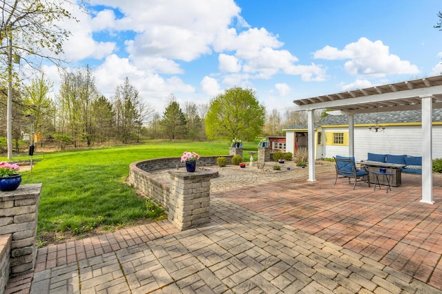 view of patio / terrace featuring an outdoor hangout area, a pergola, and an outbuilding
