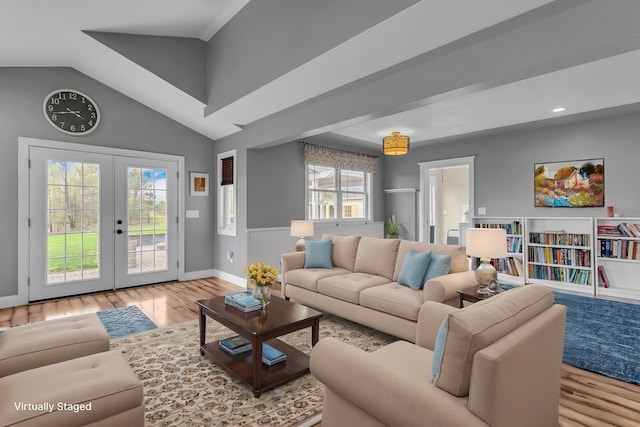 living room featuring french doors, vaulted ceiling, wood finished floors, baseboards, and recessed lighting