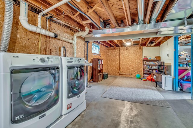 laundry area with laundry area and washing machine and dryer
