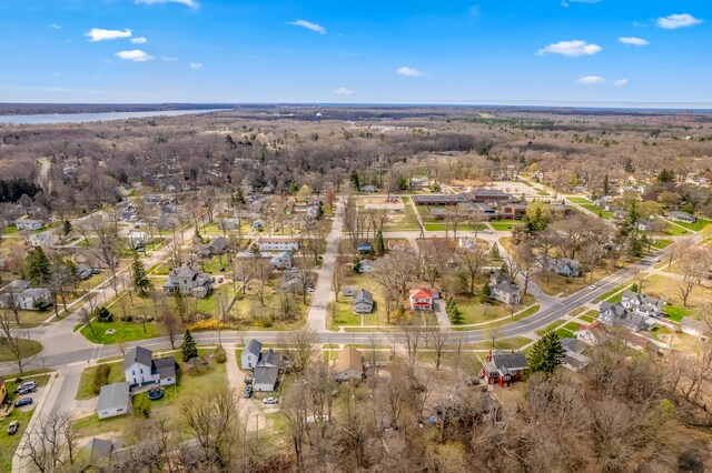 aerial view featuring a water view and a residential view