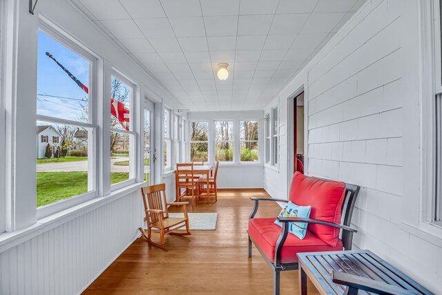 sunroom featuring wood finished floors