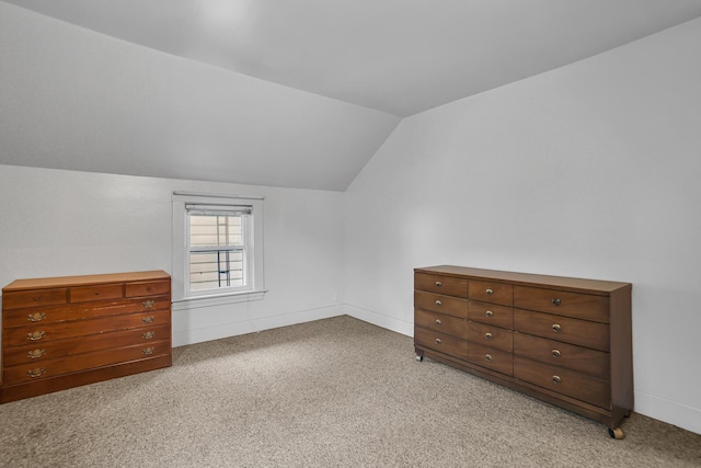 1319 Rhodes St, Jackson, MI 49202 - bonus room featuring lofted ceiling and light colored carpet