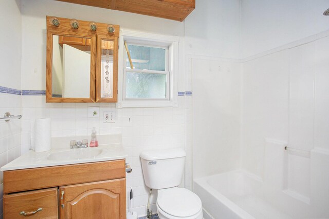 full bath with a tub, vanity, walk in shower, and toilet