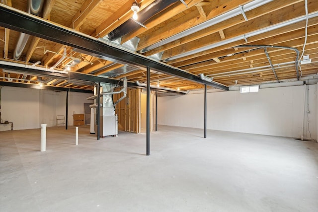 below grade area featuring heating unit