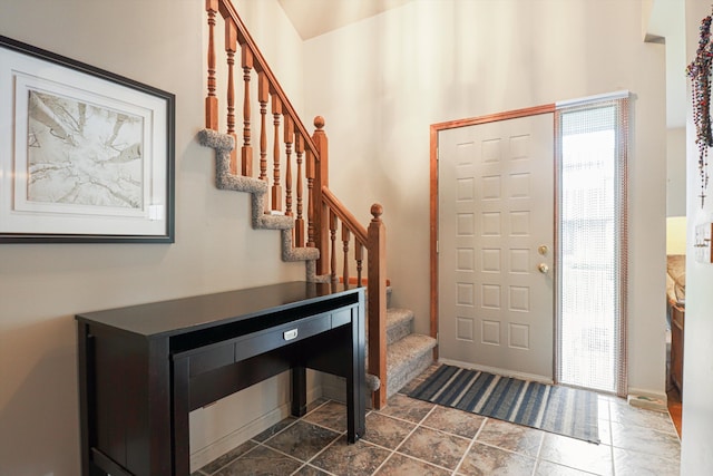 20425 Villa Grande Cir Unit # 31, Clinton Township, MI 48038 - entrance foyer featuring baseboards, stone finish flooring, and stairway