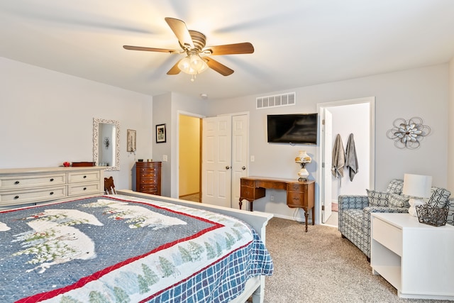 bedroom with visible vents, baseboards, ceiling fan, and light colored carpet