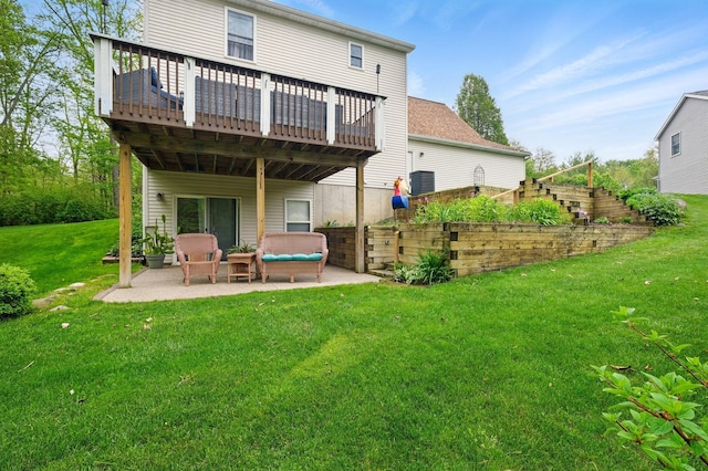 2008 Laurel Oak Dr, Howell, MI 48855 - rear view of house with a patio area, a wooden deck, a yard, and outdoor lounge area
