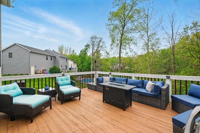 2008 Laurel Oak Dr, Howell, MI 48855 - wooden terrace with an outdoor living space with a fire pit
