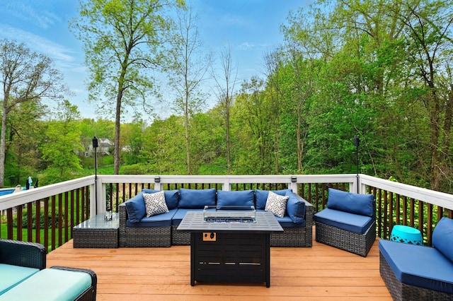 2008 Laurel Oak Dr, Howell, MI 48855 - wooden deck featuring an outdoor living space with a fire pit and a forest view