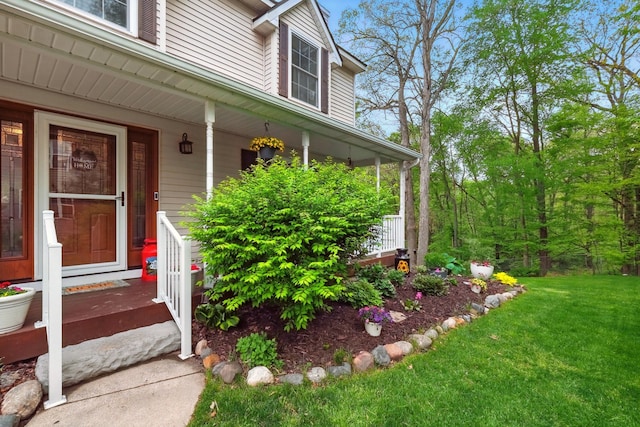 2008 Laurel Oak Dr, Howell, MI 48855 - entrance to property featuring a porch and a lawn