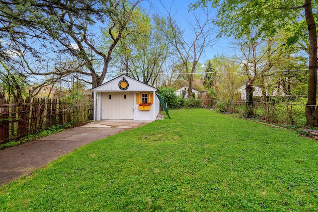 11718 Wayburn St, Detroit, MI 48224 - view of yard featuring an outbuilding and driveway