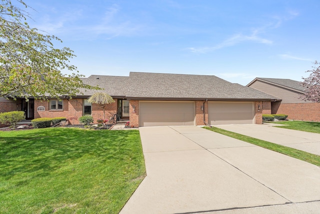 view of front of home with a garage, a front lawn, roof with shingles, brick siding, and driveway