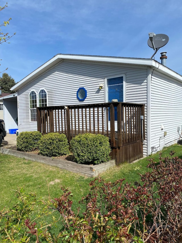 exterior space featuring a wooden deck