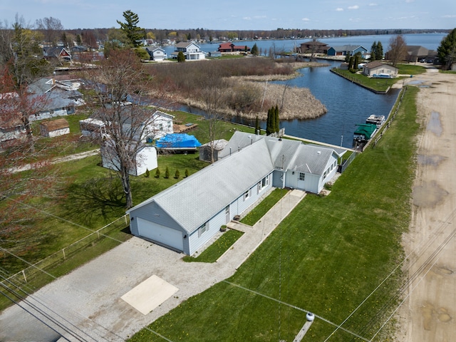 aerial view of residential area with a nearby body of water