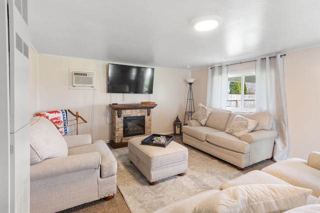 living room with a fireplace, carpet floors, and a wall mounted AC