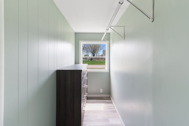 walk in closet featuring light wood-type flooring