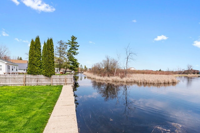 water view featuring fence