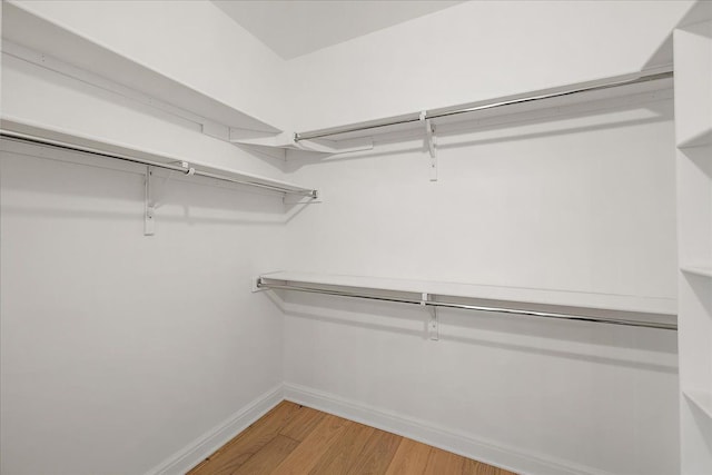 720 Marlayna Dr, Oxford, MI 48371 - spacious closet featuring light wood-type flooring