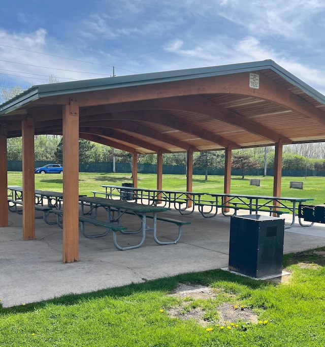 surrounding community featuring a gazebo and a lawn